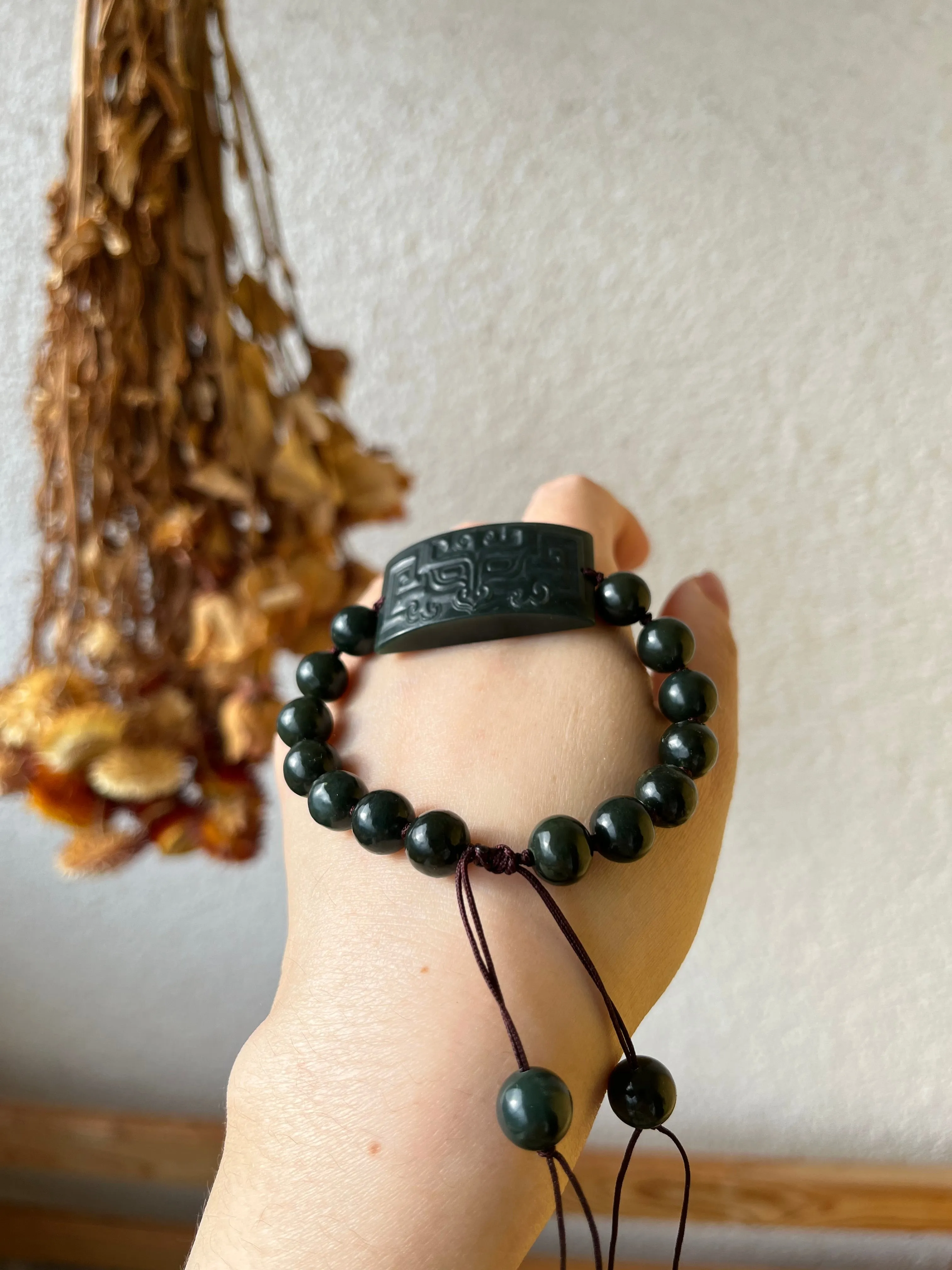 Hand-woven Bracelet with a Carved Dark Cyan Hetian Jade Beast Face Pendant and Beads (9mm)