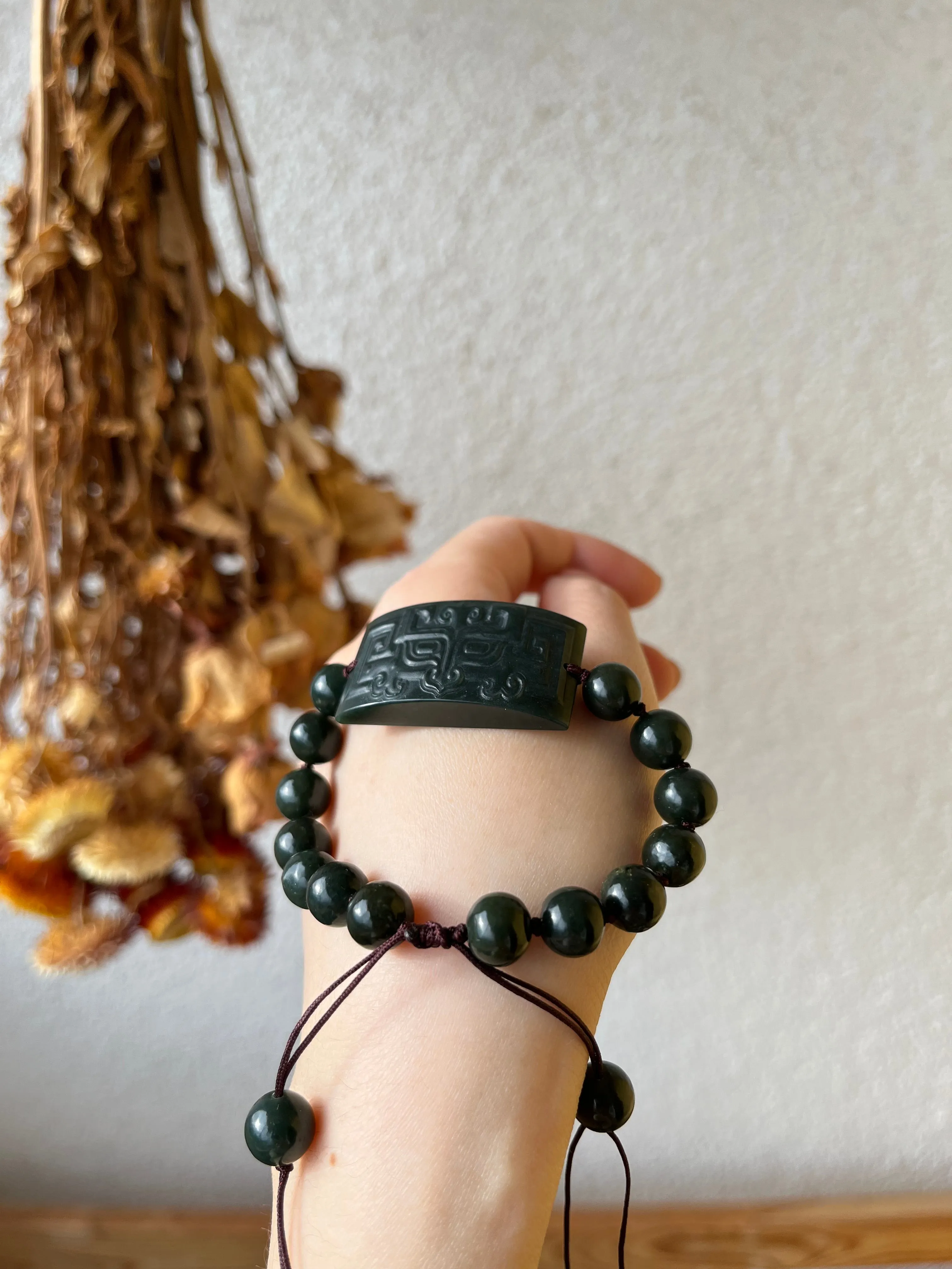 Hand-woven Bracelet with a Carved Dark Cyan Hetian Jade Beast Face Pendant and Beads (9mm)